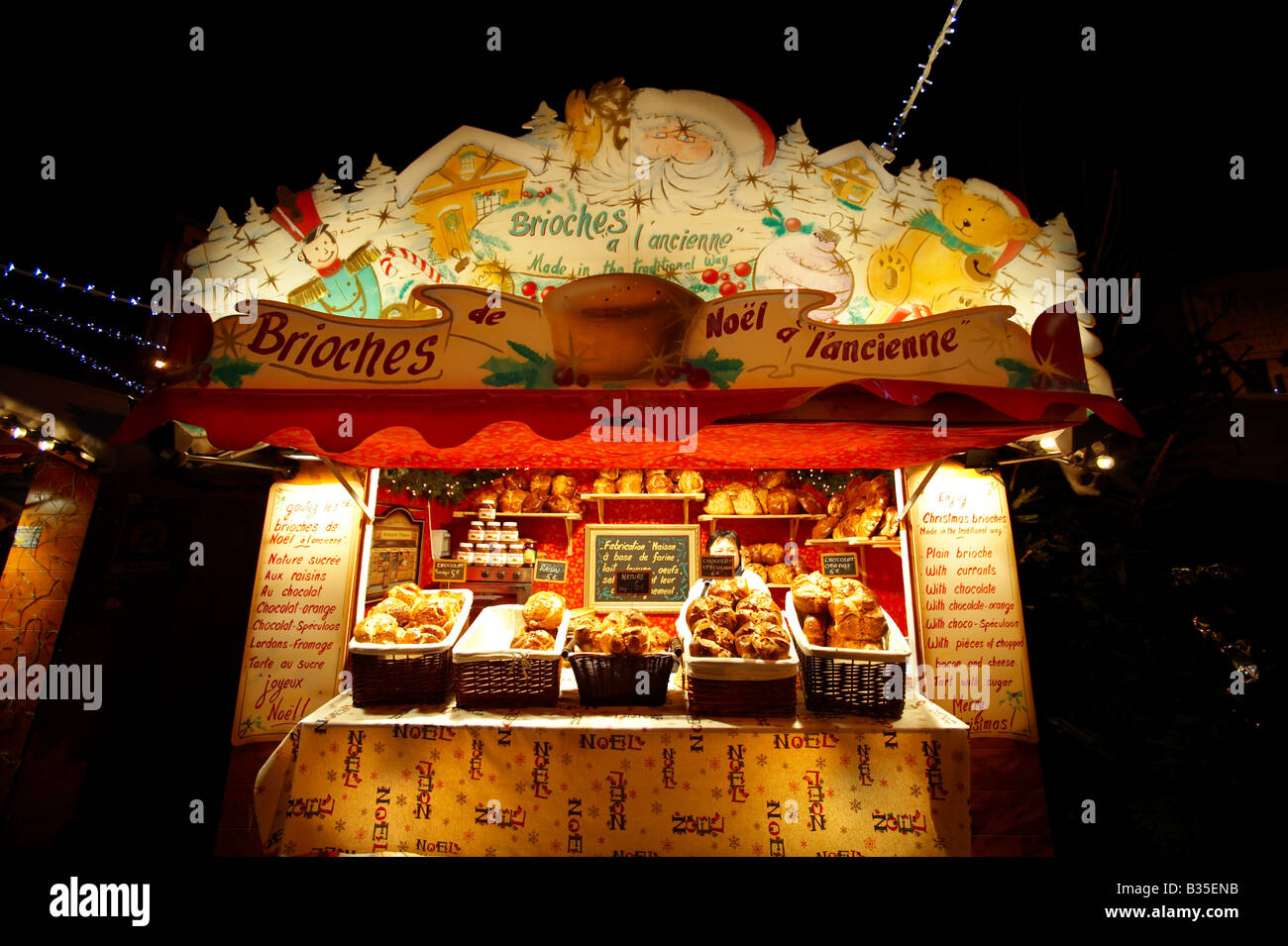 Christmas market at dusk with a food stall - Lille France Stock Photo