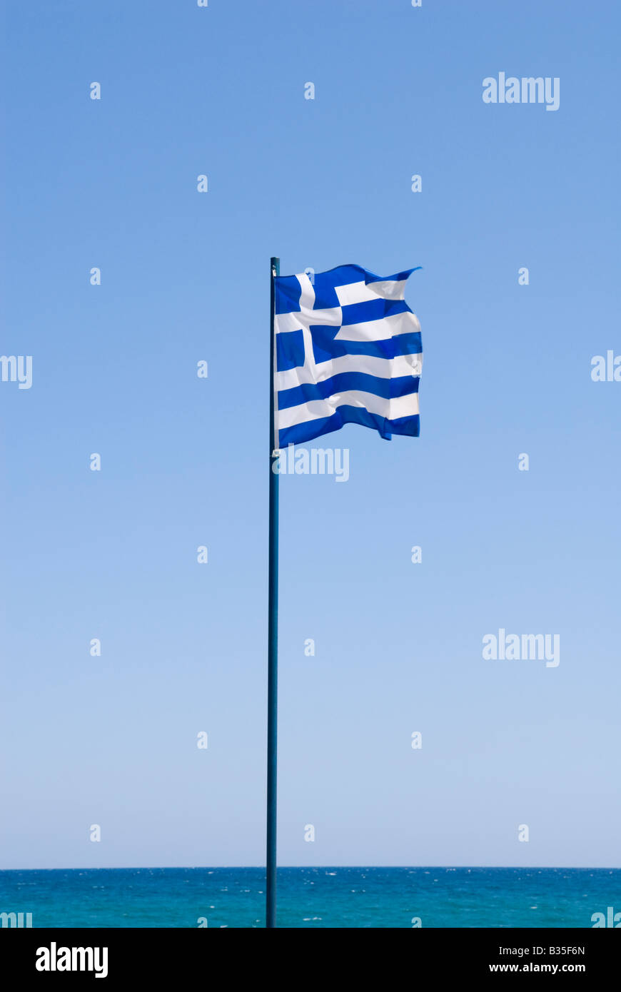 Greek National Flag flying on Rethymnon Beach Crete Stock Photo
