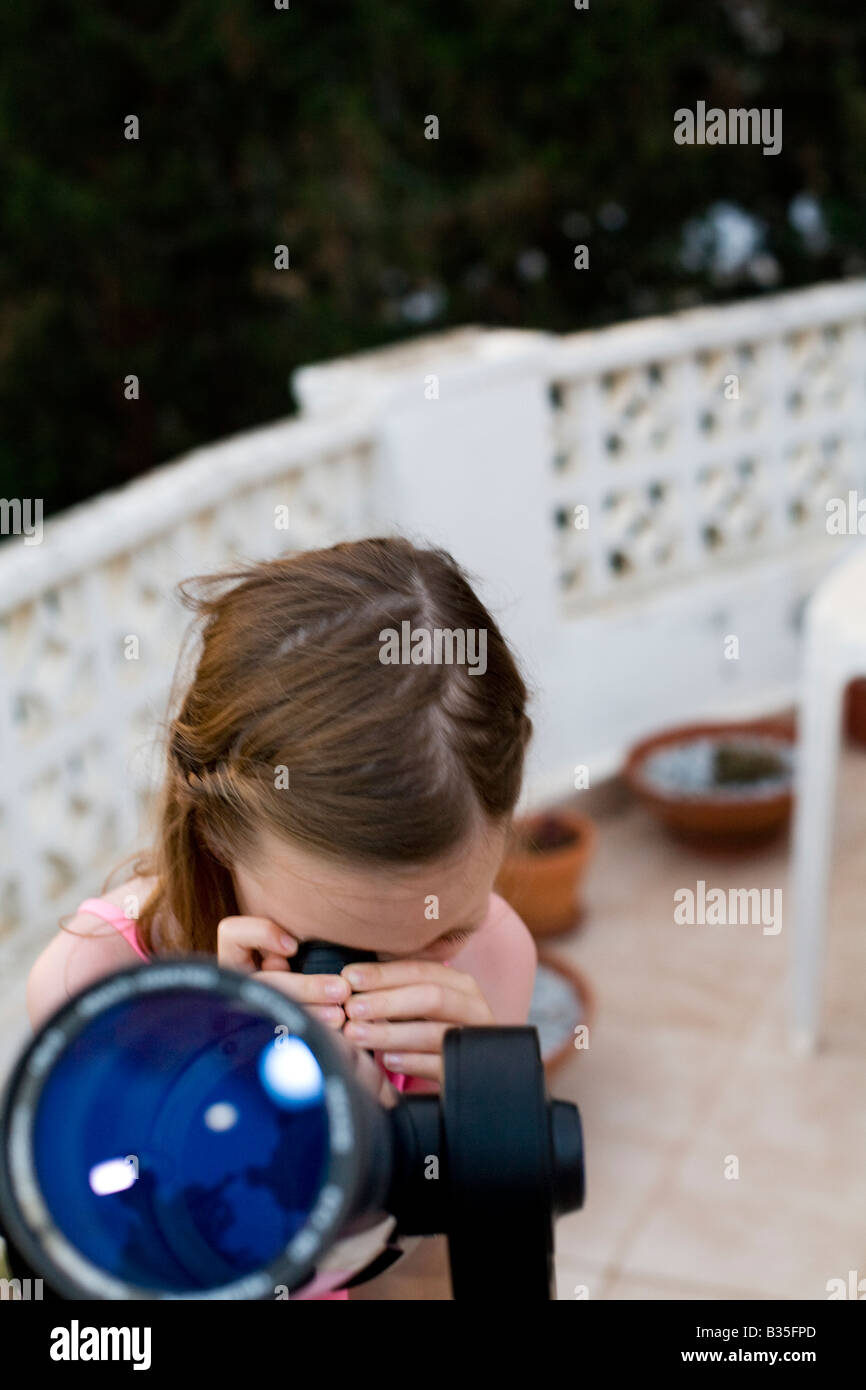 Watching the sky through a telescope Stock Photo Alamy