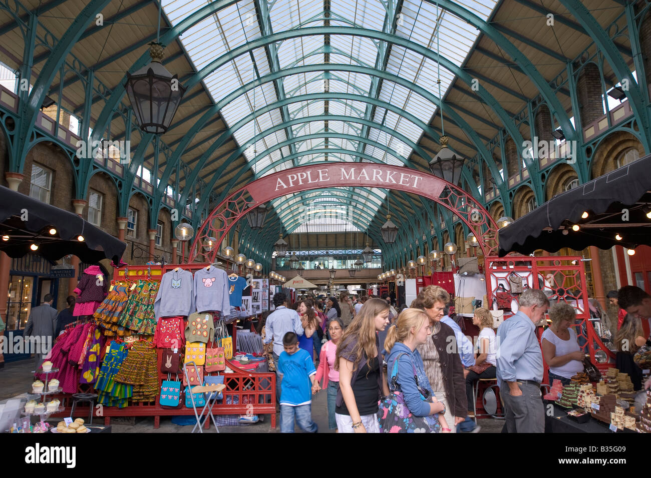 People shop at the Apple Market Covent Garden WC2 London United Kingdom Stock Photo