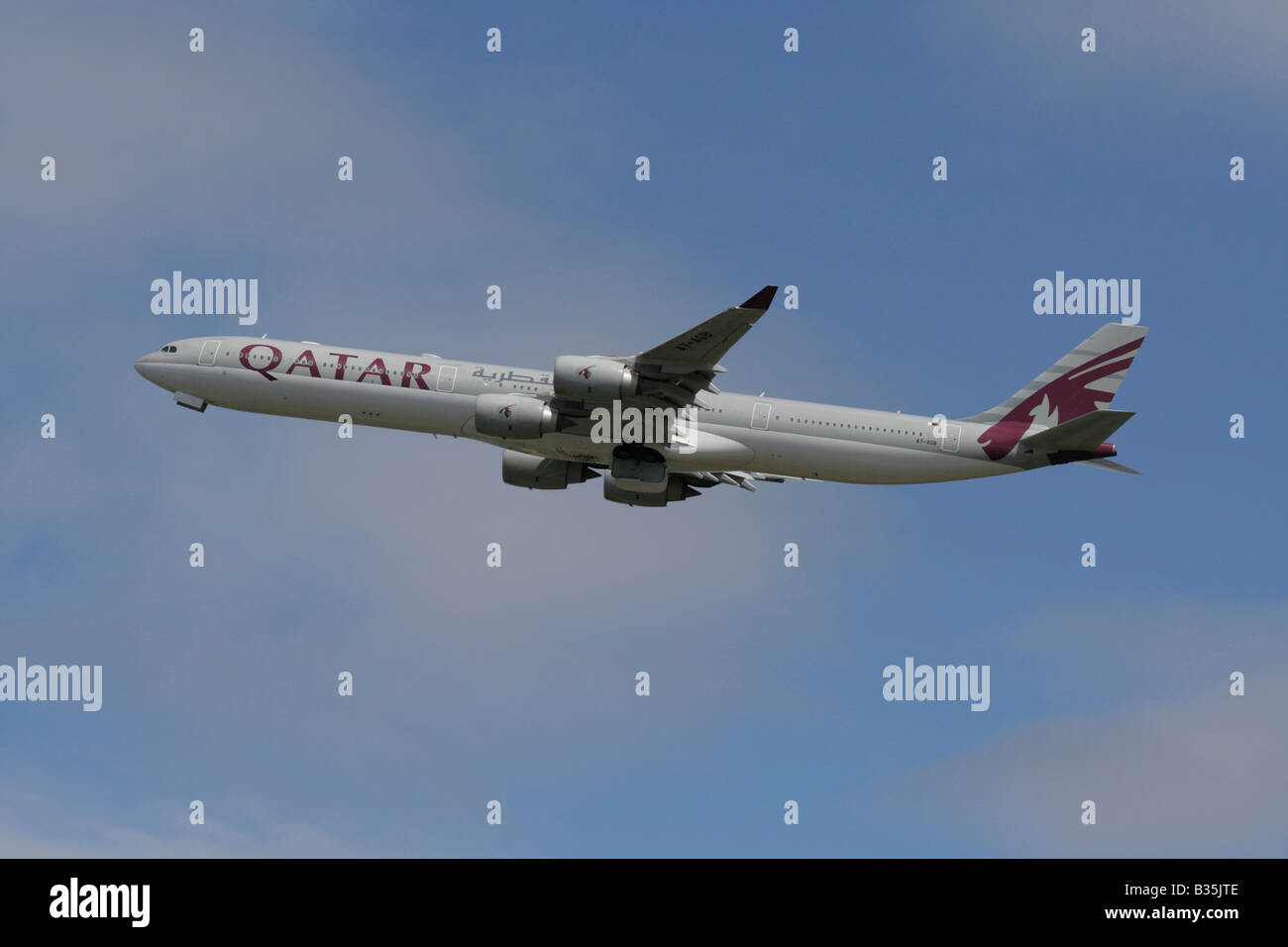 Qatar Airways Airbus A340-600 climbing on departure from Heathrow Airport Stock Photo