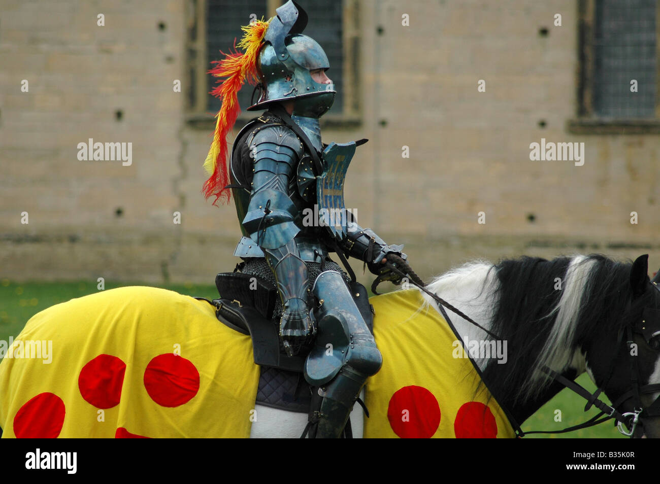 Knight in armour mounted on horse Stock Photo