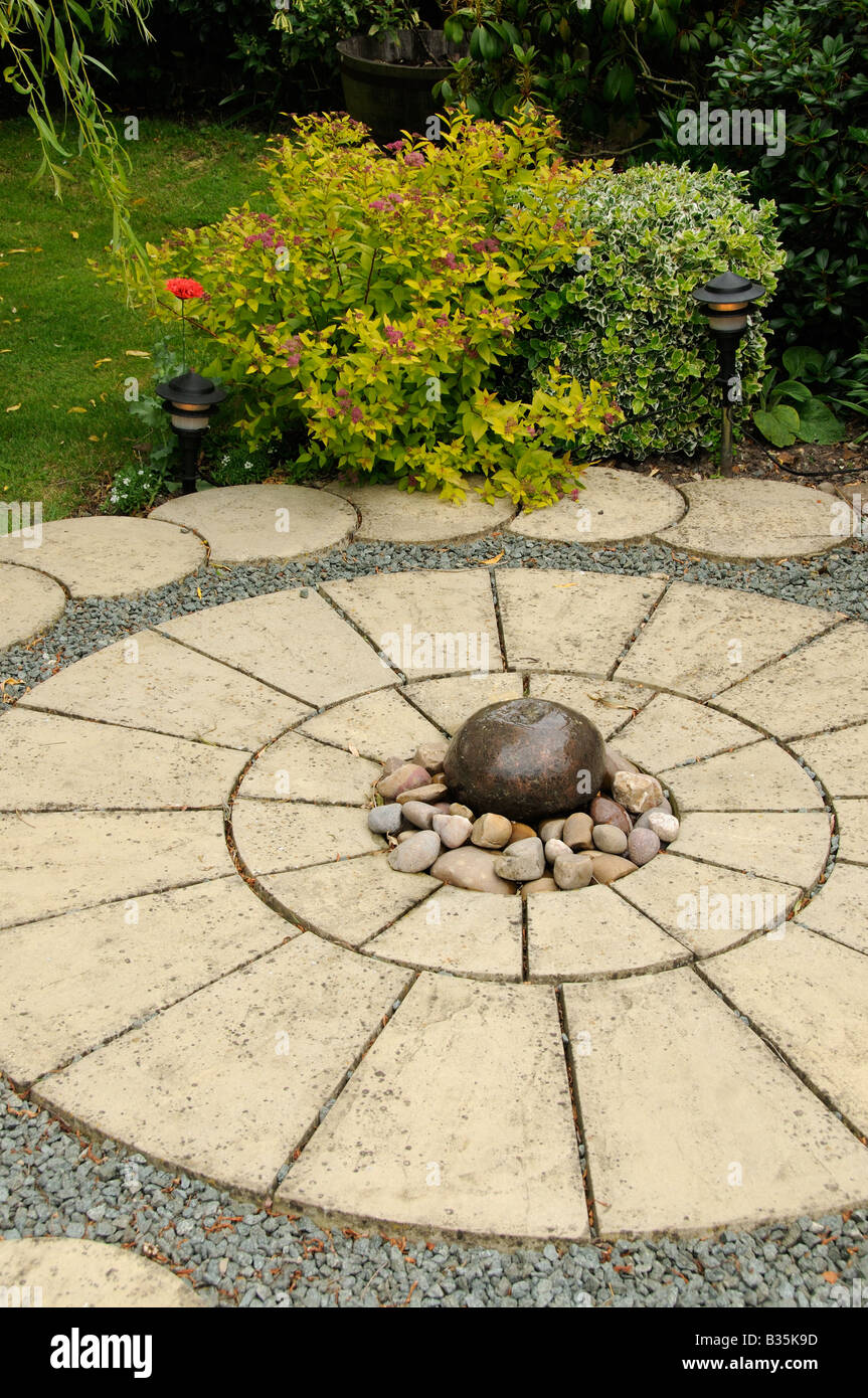Circular Garden Paving With Central Water Feature Stock Photo