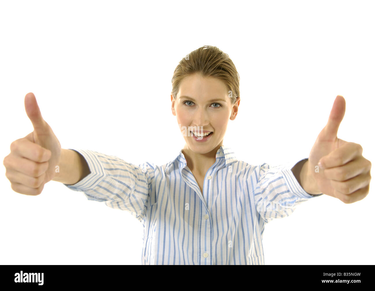Portrait of a young woman making a thumbs up sign Stock Photo - Alamy
