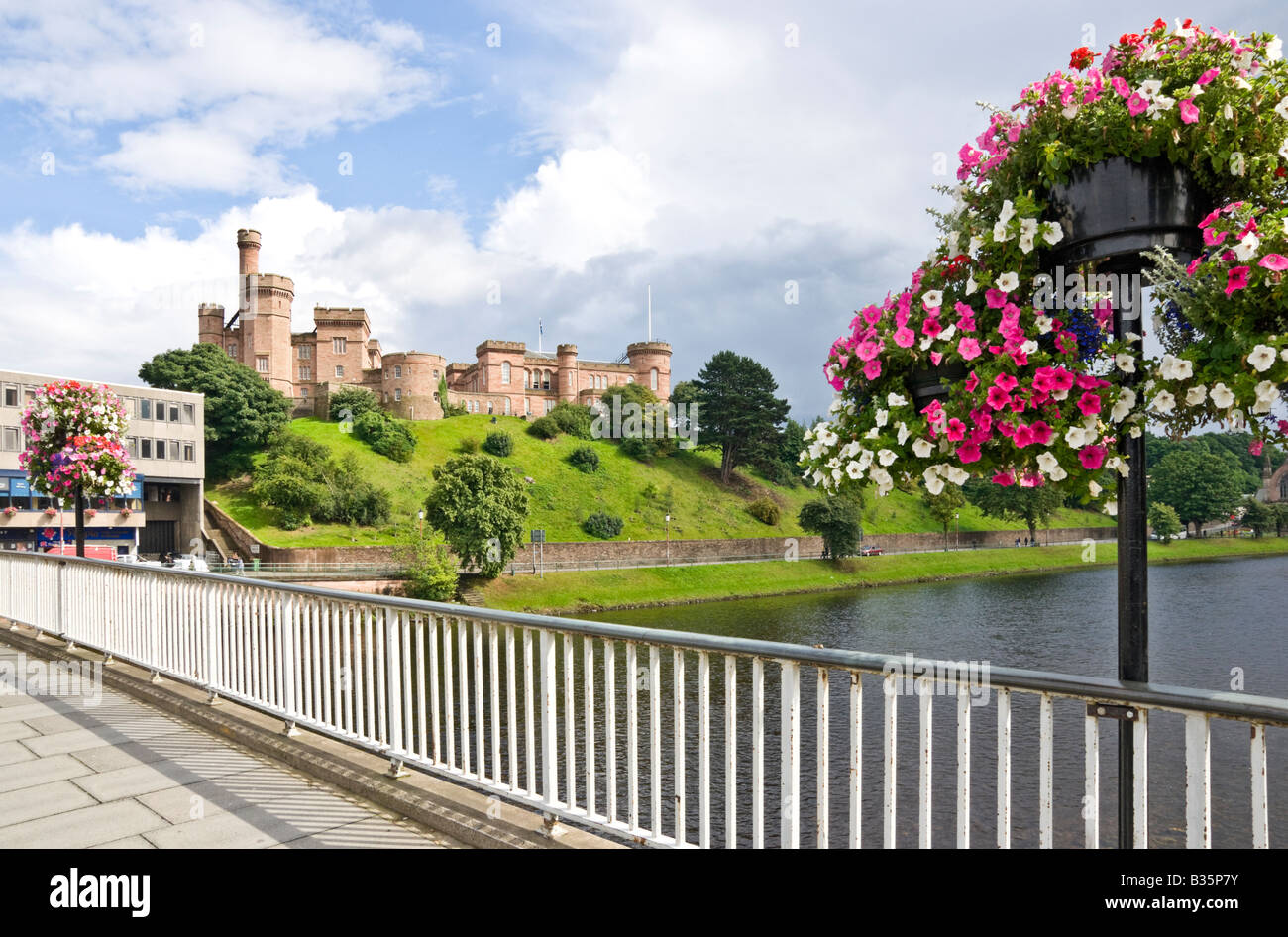 Inverness Castle viewed from bridge spanning River Ness in Inverness Scotland  on a sunny summer afternoon Stock Photo