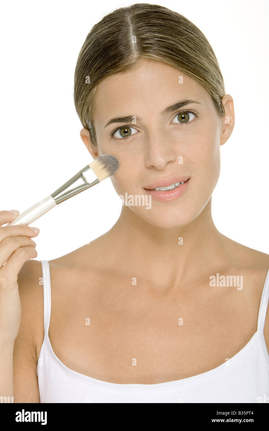 Portrait Of A Woman Putting Face Powder On Her Face Hi Res Stock Photography And Images Alamy