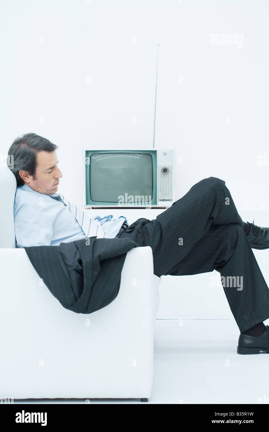 Old man sleeping in armchair hires stock photography and images Alamy