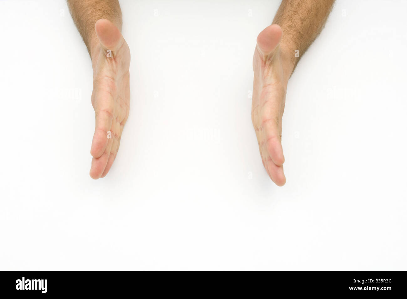 Open palms facing each other, cropped view Stock Photo Alamy