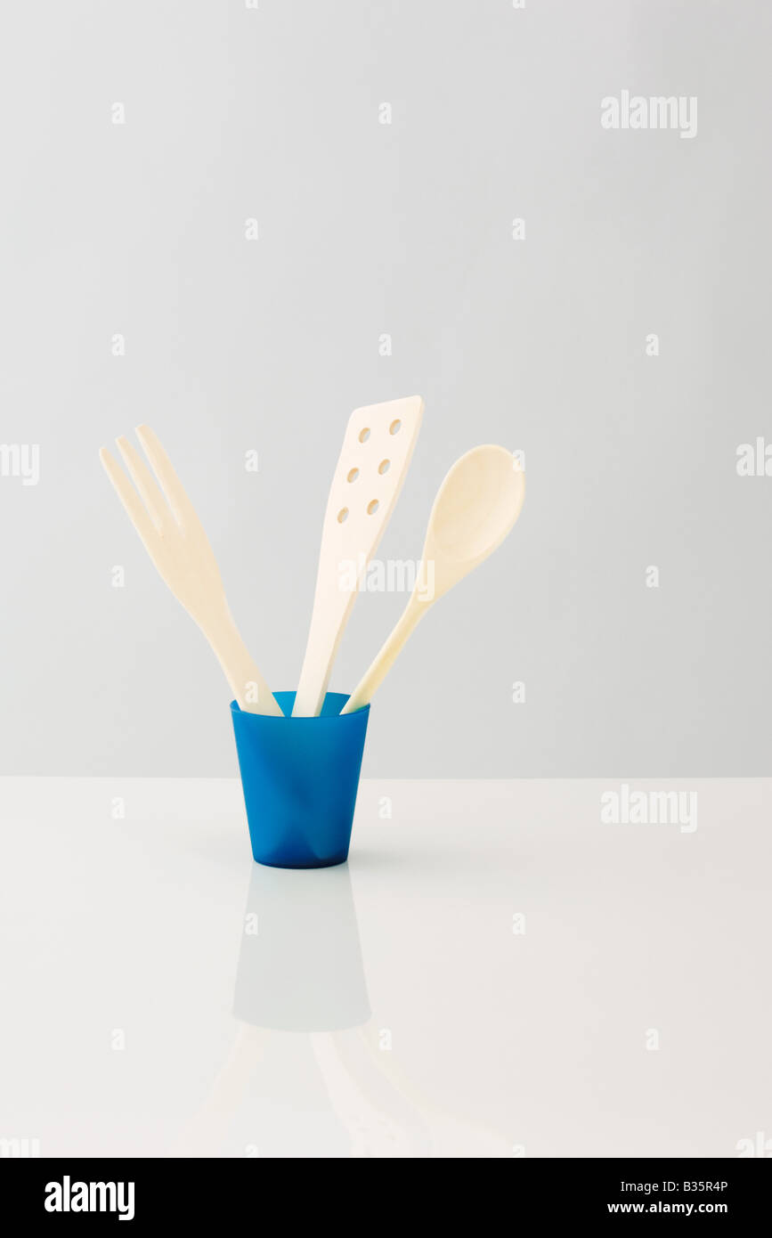 Cooking utensils stored in cup Stock Photo Alamy