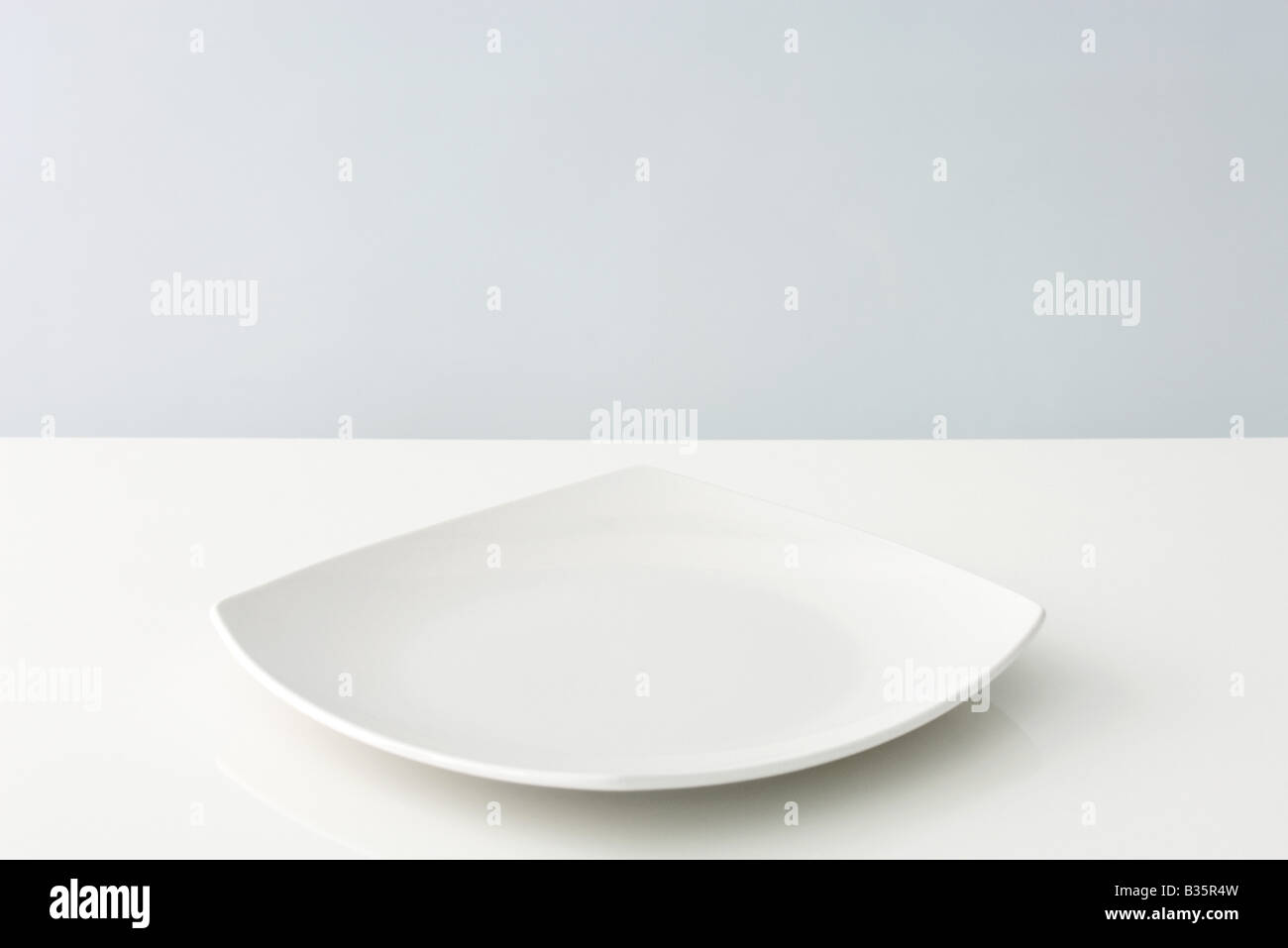 Curved plate, closeup Stock Photo Alamy