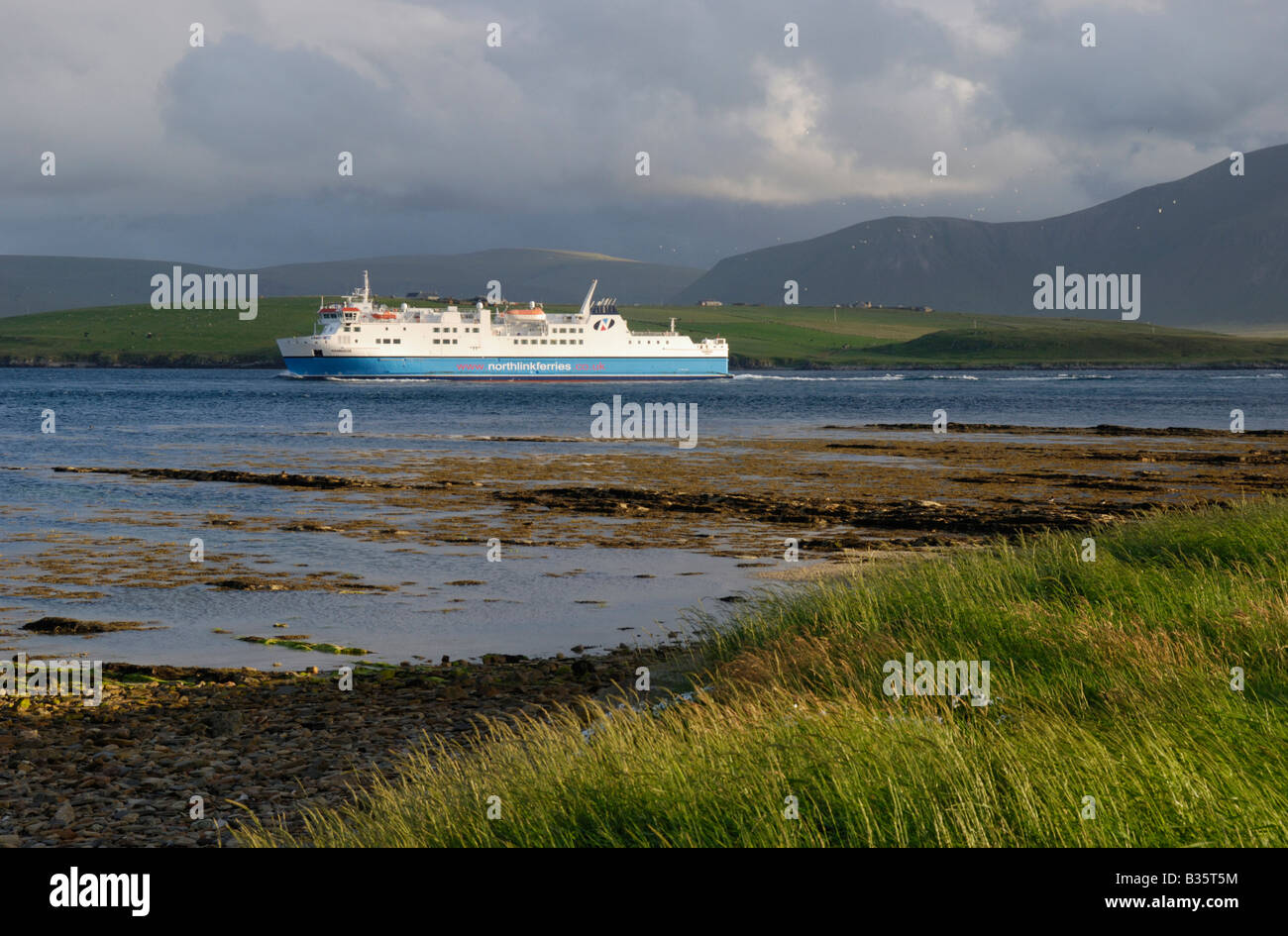 Ferry on way to Stromness Orkney Scotland with Hoy in background Stock Photo