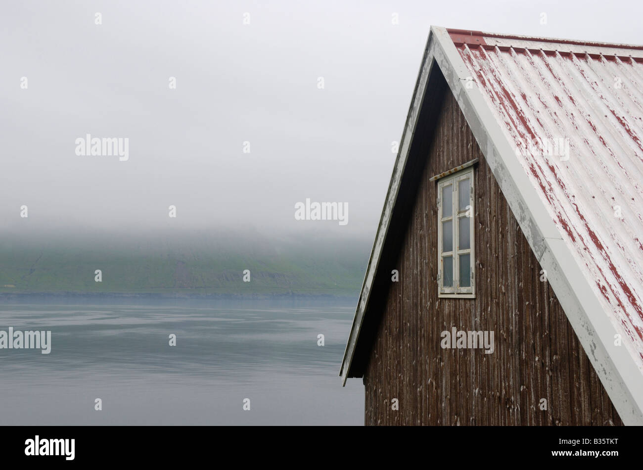House in mist Kunoy Faroe Islands Stock Photo