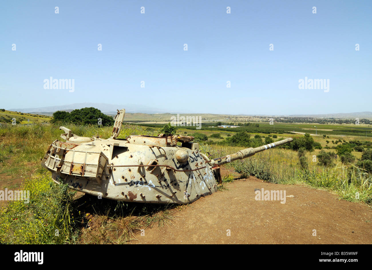 Remains of a Syrian tank destroyed during the Israeli-Arab wars; photo taken on the Golan heights. Stock Photo
