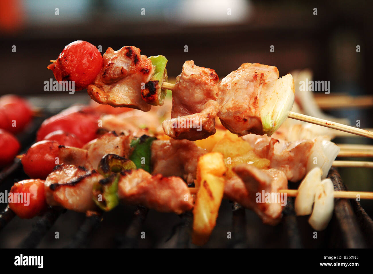 Barbecue or barbeque is a method and apparatus for cooking food Stock Photo