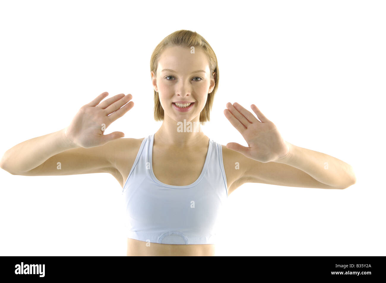 Portrait of a young woman exercising Stock Photo - Alamy