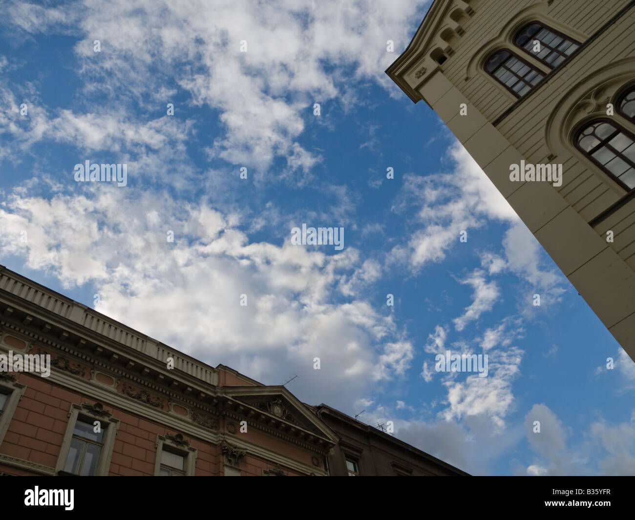 Black and White image of upper part of two buildings. Stock Photo