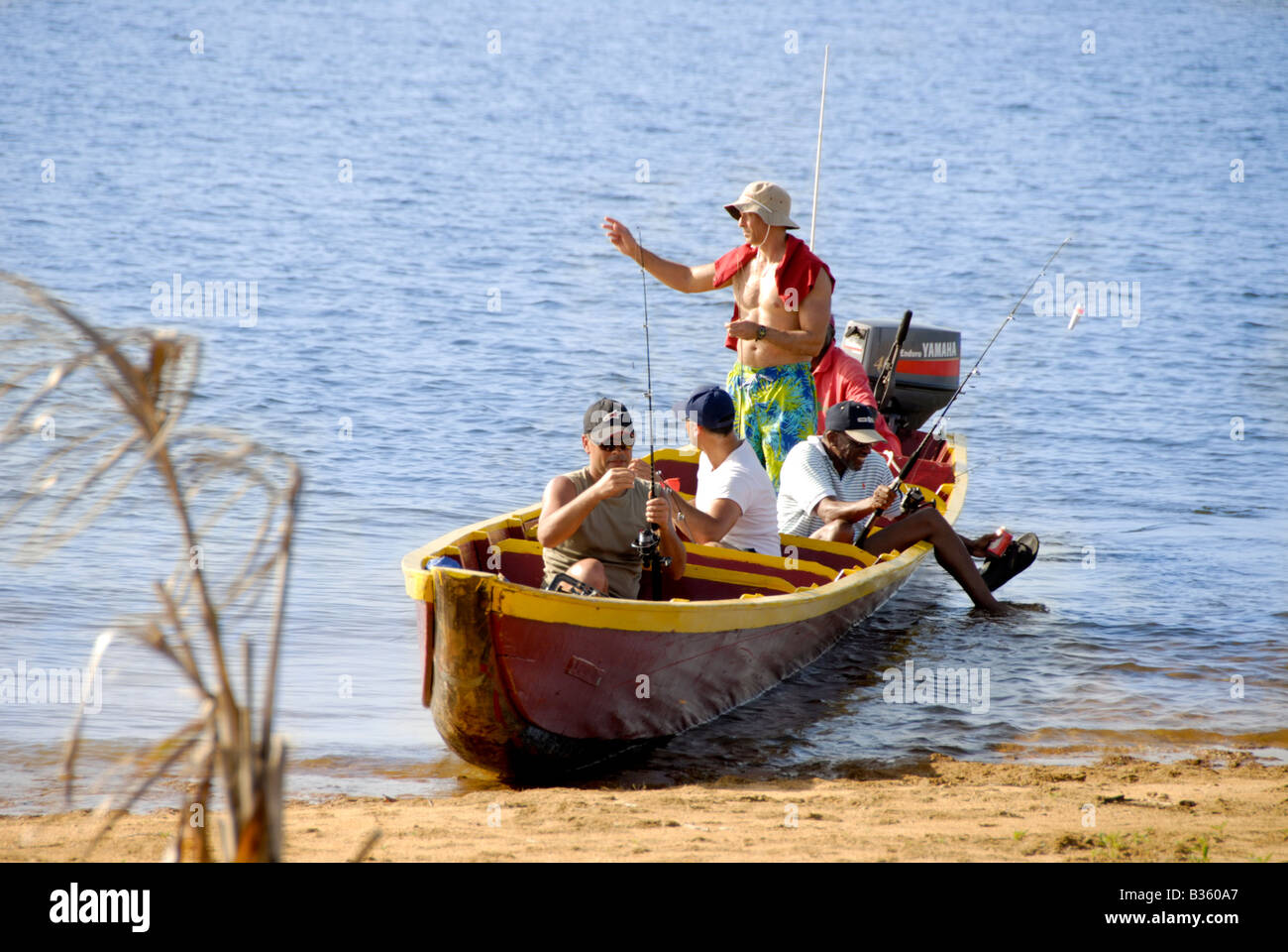 Colorful red tourist boat hi-res stock photography and images - Alamy