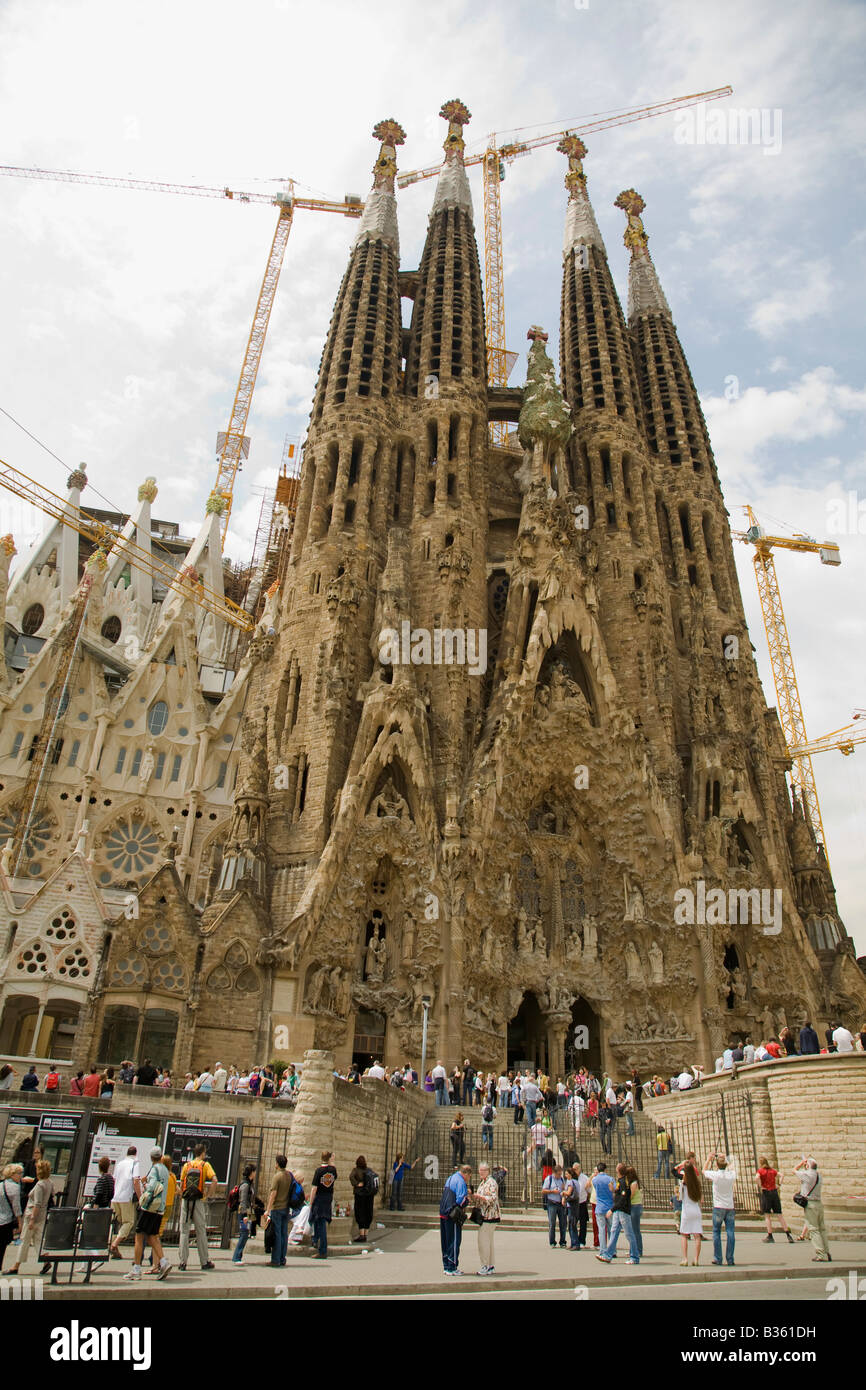 SPAIN Barcelona East Nativity Facade of Sagrada Familia church designed Antoni Gaudi architect construction cranes Stock Photo