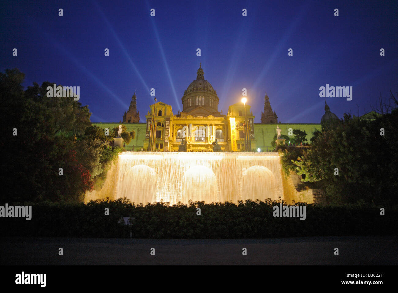 The National Art Museum of Catalonia in Barcelona Spain illuminated at night during the Fiesta de Montjuic Stock Photo