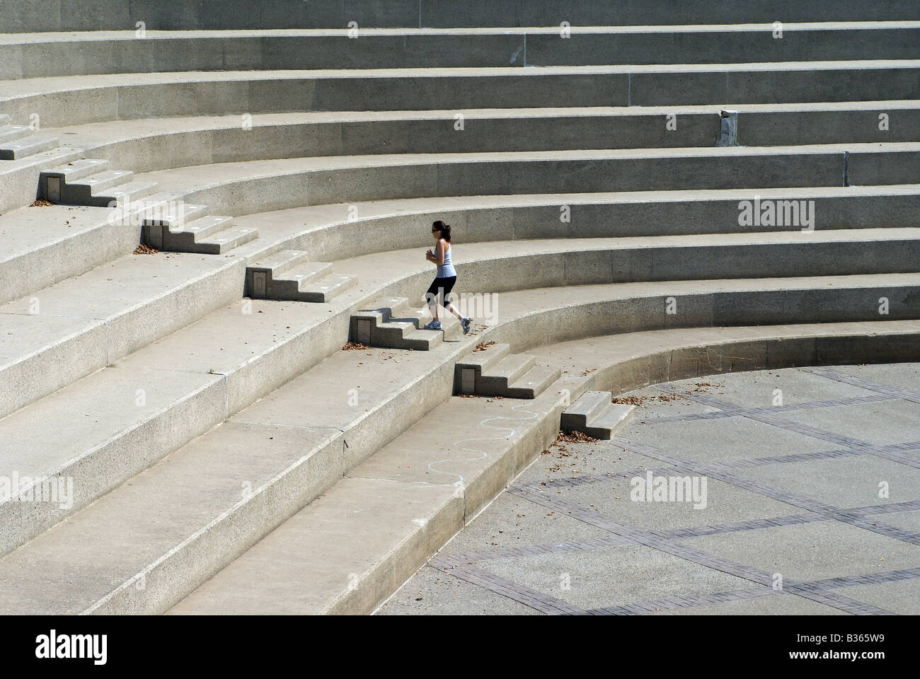 Jogging Up Steps Stock Photo