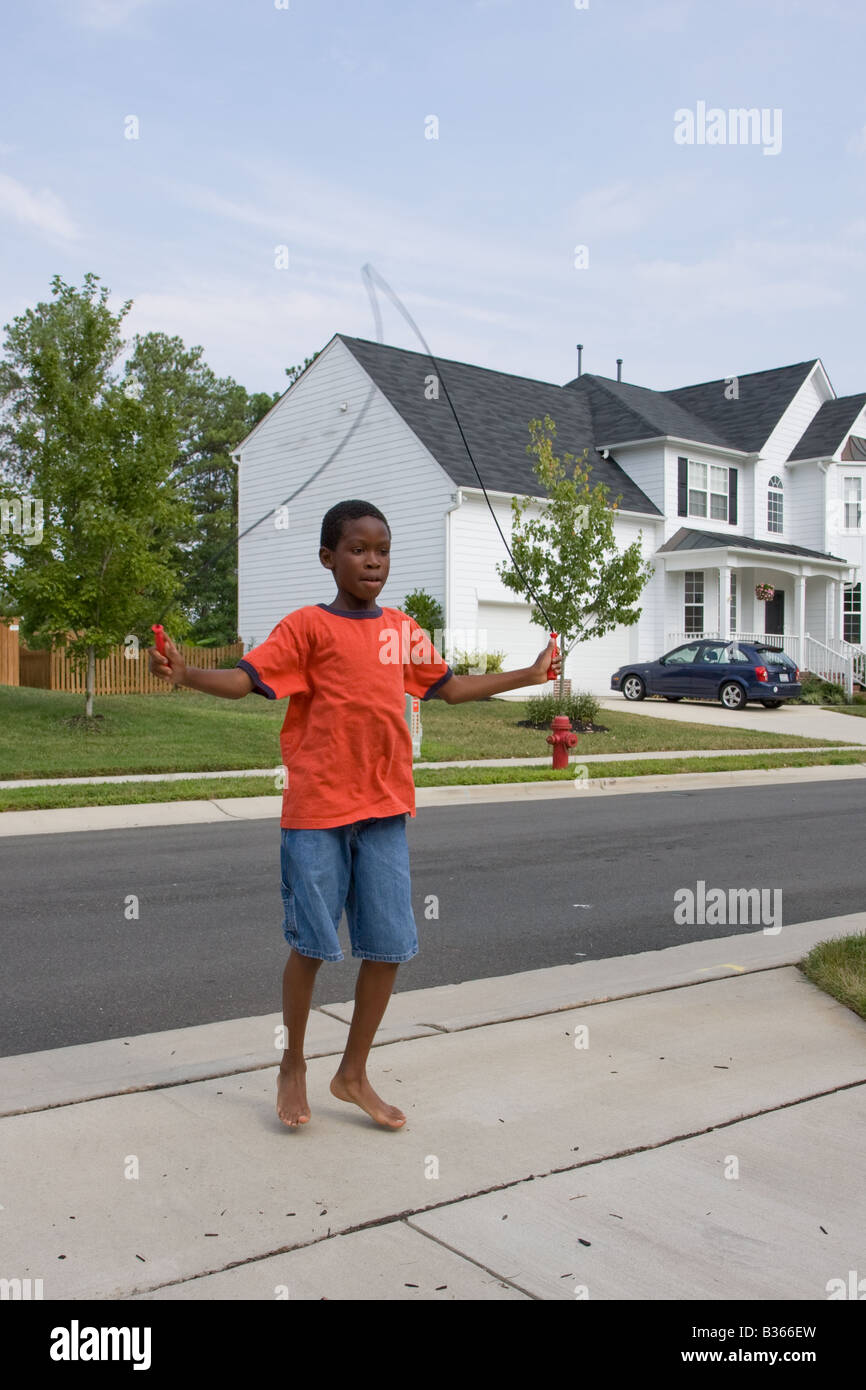 African american girl jumping rope hi-res stock photography and images ...