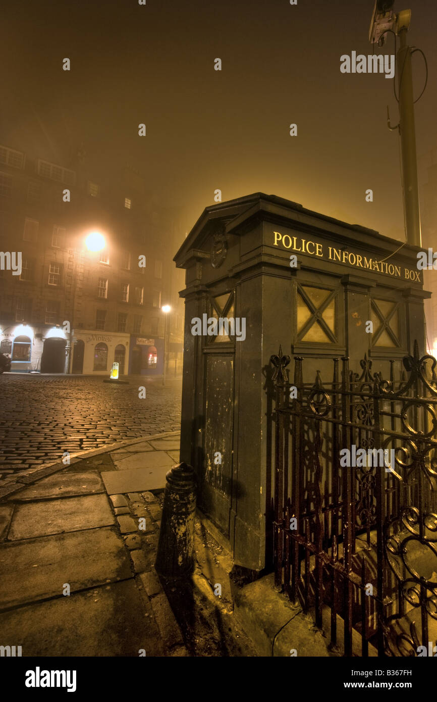 A police box on a foggy night in the Grassmarket, Edinburgh Stock Photo