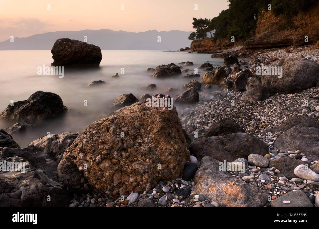 Twilight seascape on rocky hi-res stock photography and images - Alamy