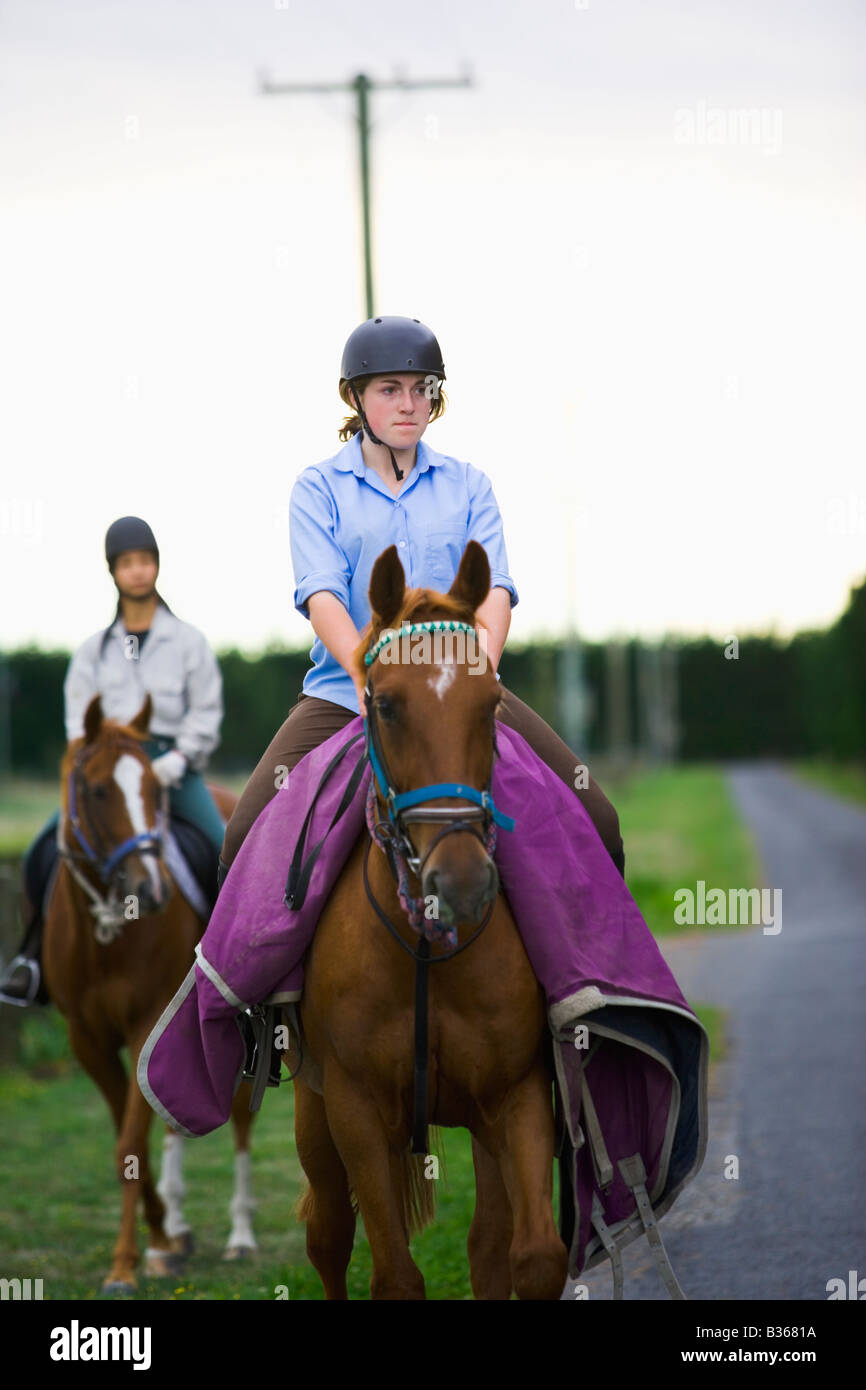 Blond girl riding horse hi-res stock photography and images - Alamy