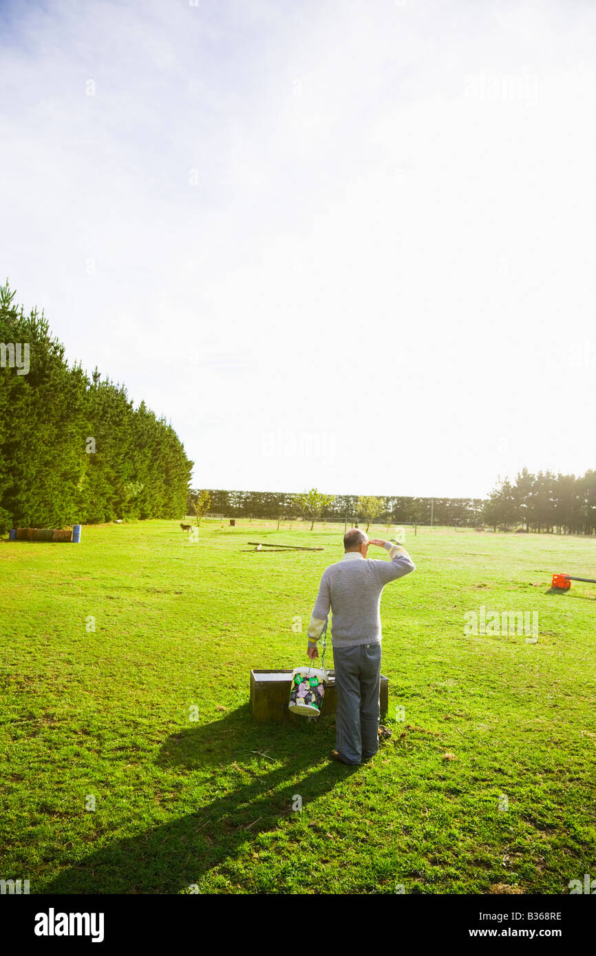 One senior man standing hi-res stock photography and images - Alamy