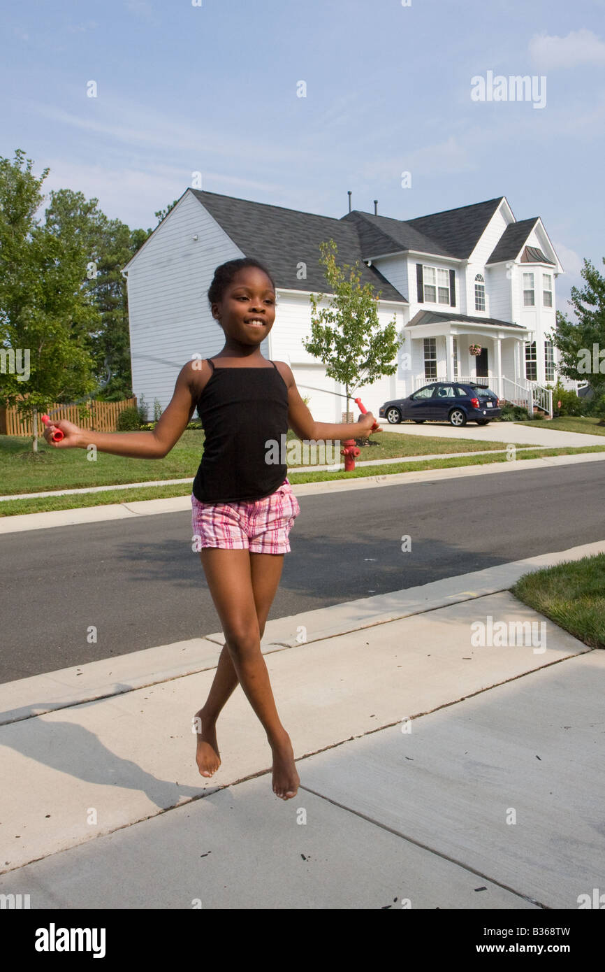 African american girl jumping rope hi-res stock photography and images ...