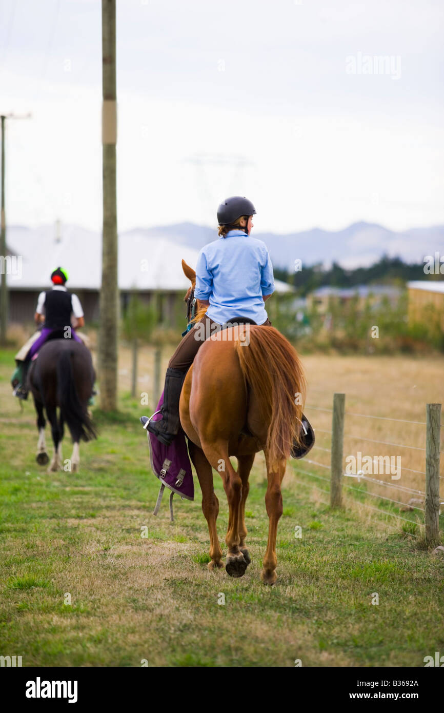 Blond girl riding horse hi-res stock photography and images - Alamy