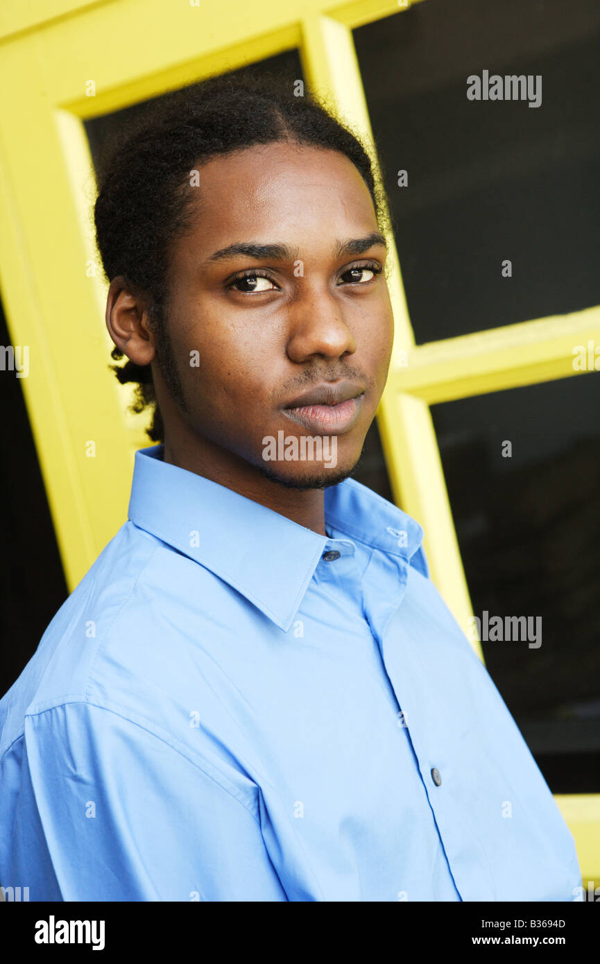 portrait of a young African American man standing outdoors Stock Photo ...