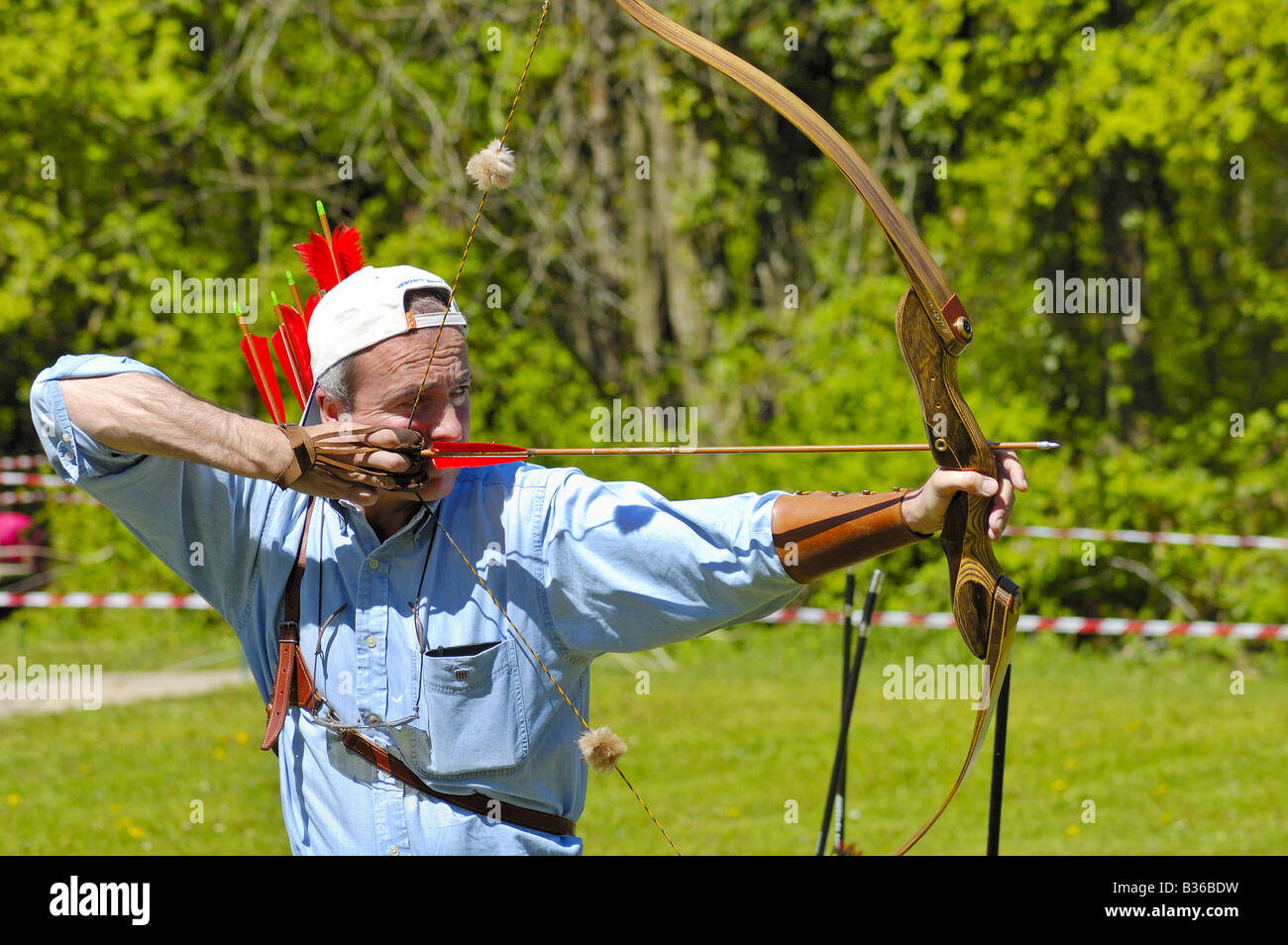 Archer in action Stock Photo Alamy