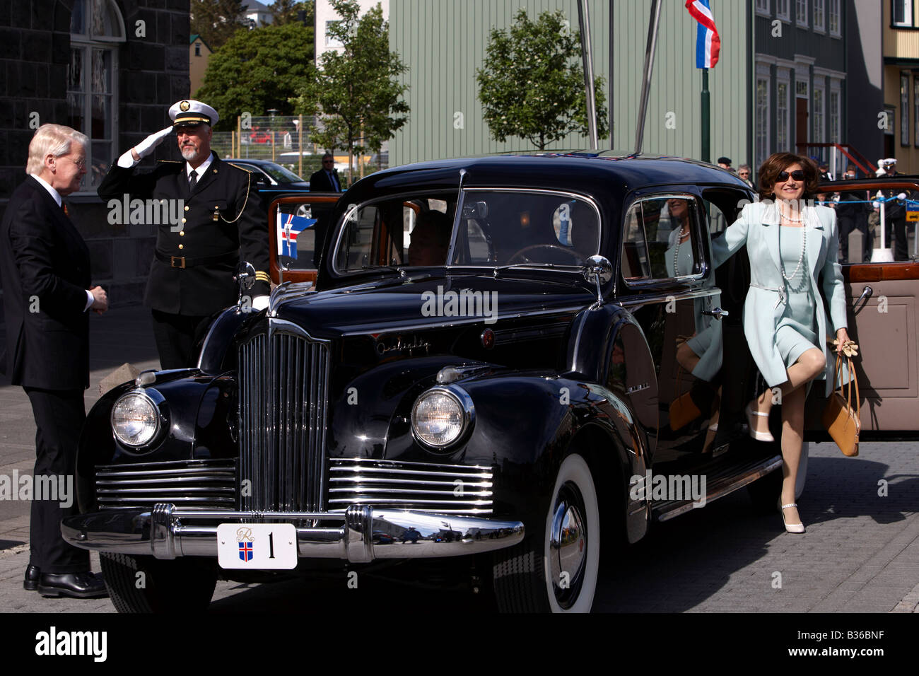 The President of Iceland, Mr Olafur Ragnar Grimsson and the first lady, Dorritt Moussaieff arrives in old Packard Stock Photo