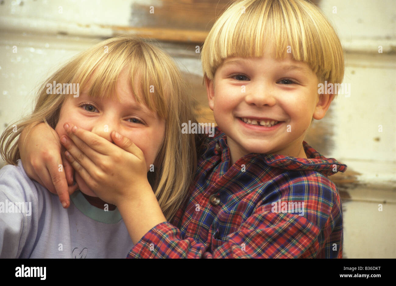 children mucking around together Stock Photo