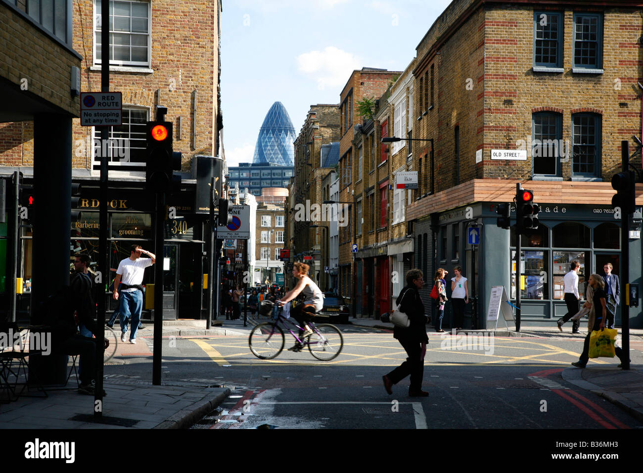 View of the Gherkin from the junction of Old Street and Charlotte Road on the Hoxton Shoreditch borders, London Stock Photo