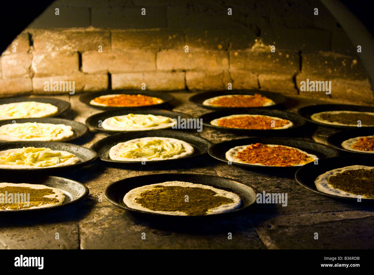 Small Pizzas in a Brick Oven in Latakia Syria Stock Photo