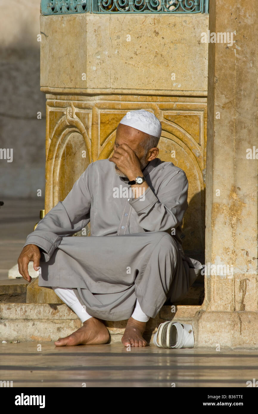 Muslim Man in the Omayyad Mosque in the Old City in Aleppo Syria Stock Photo
