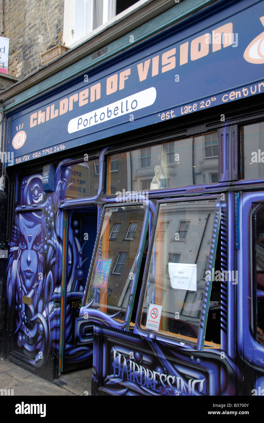 The colourful exterior of the Children of Vision hairdresser in Portobello Road London England Stock Photo