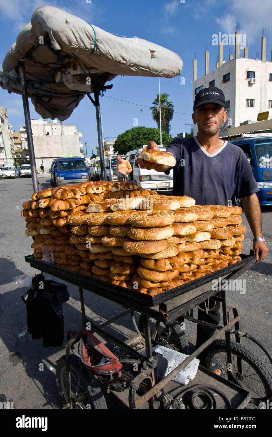 Man Selling Bread from a Cart in Lattakia Syria Stock Photo