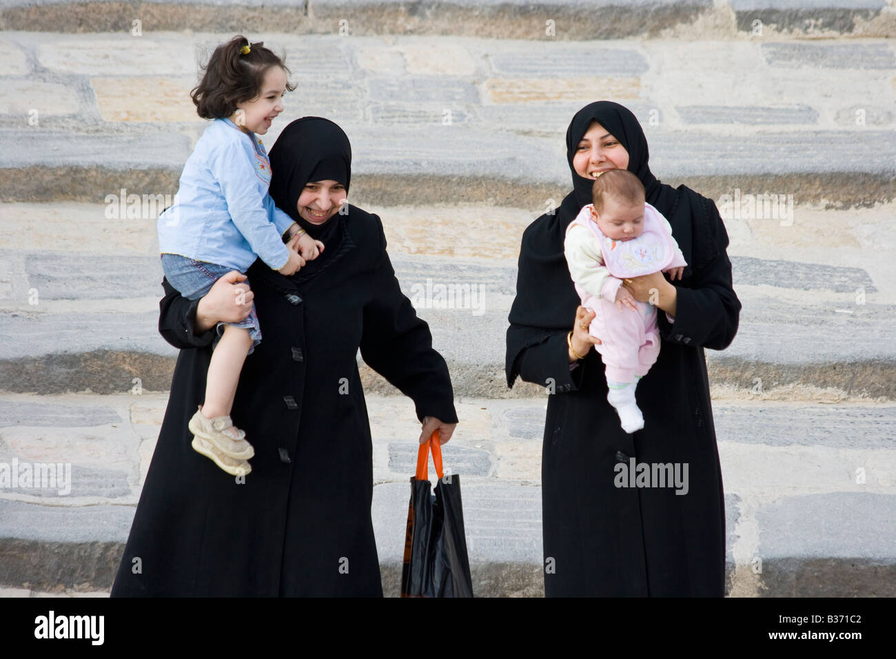 Syrian women in traditional clothing hi-res stock photography and