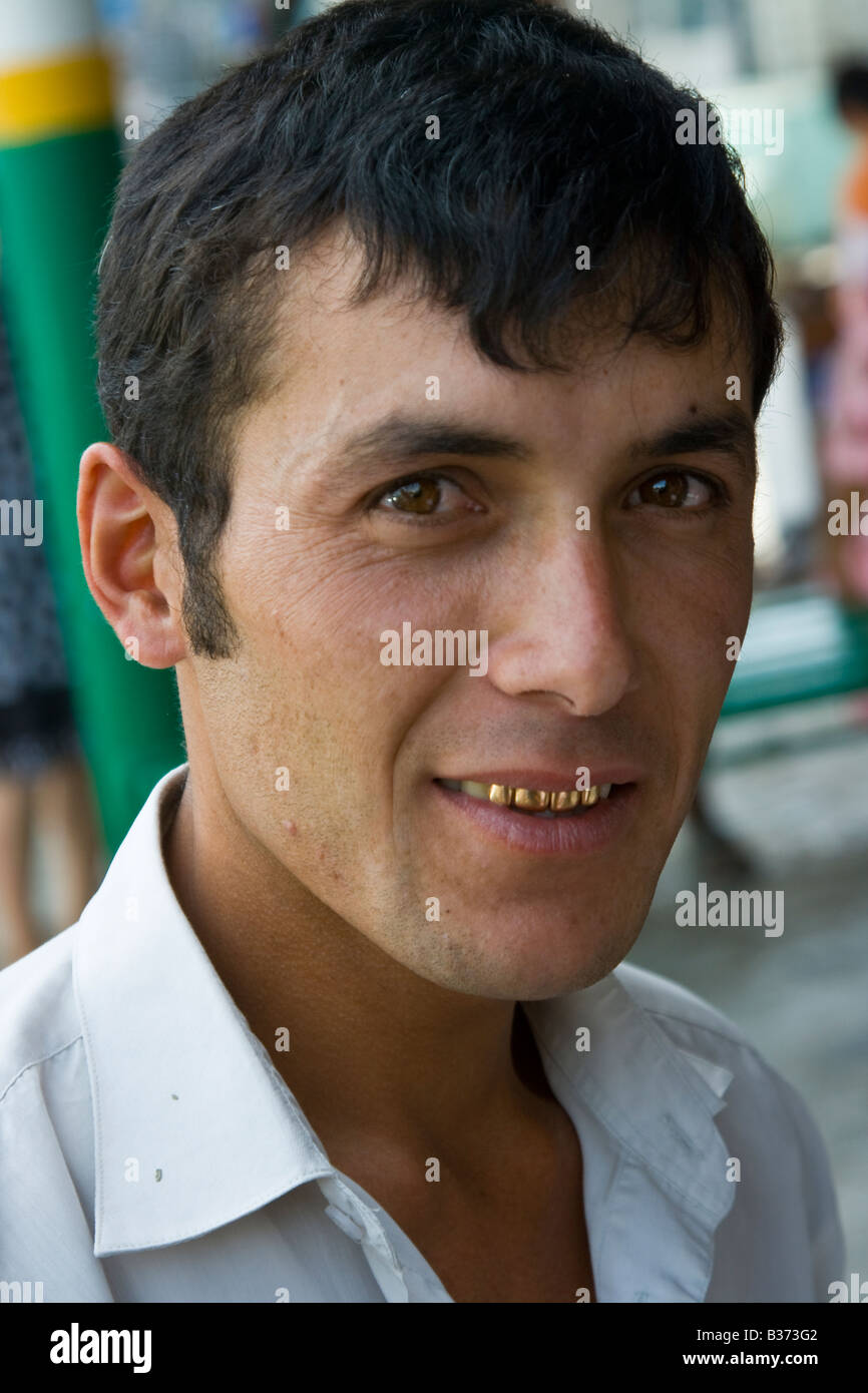 Smiling Uzbek Man with Gold Capped Teeth in Samarkand Uzbekistan Stock Photo