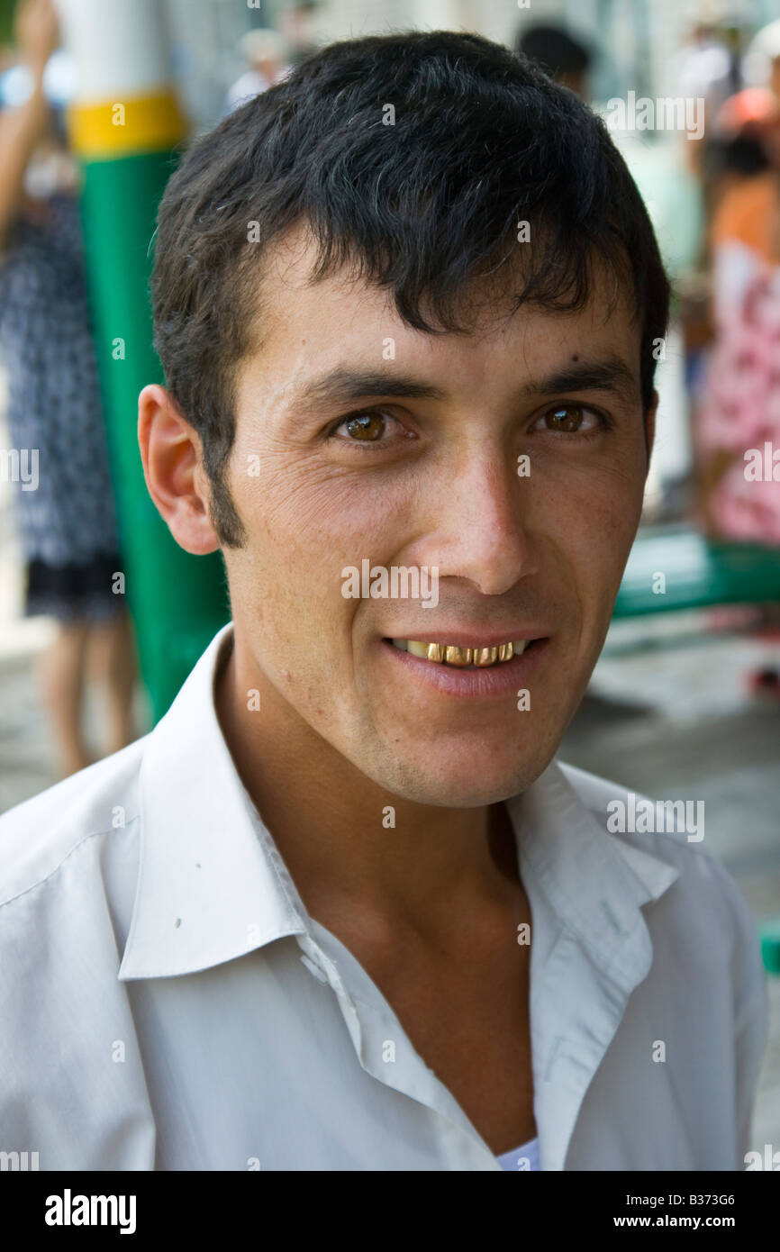 Smiling Uzbek Man with Gold Capped Teeth in Samarkand Uzbekistan Stock Photo