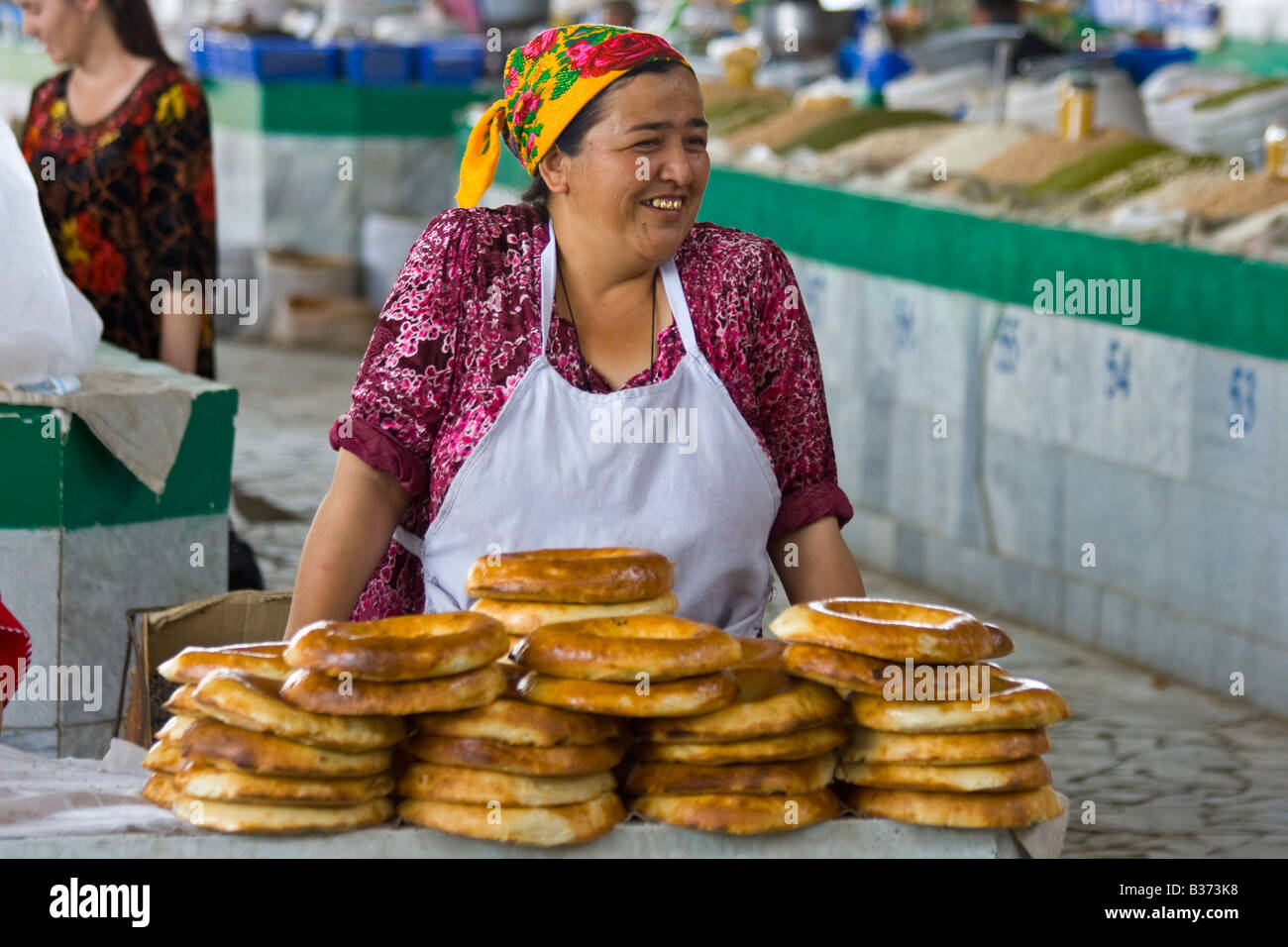 Uzbek Woman Selling Bread in the Siab Market in Samarkand Uzbekistan Stock Photo
