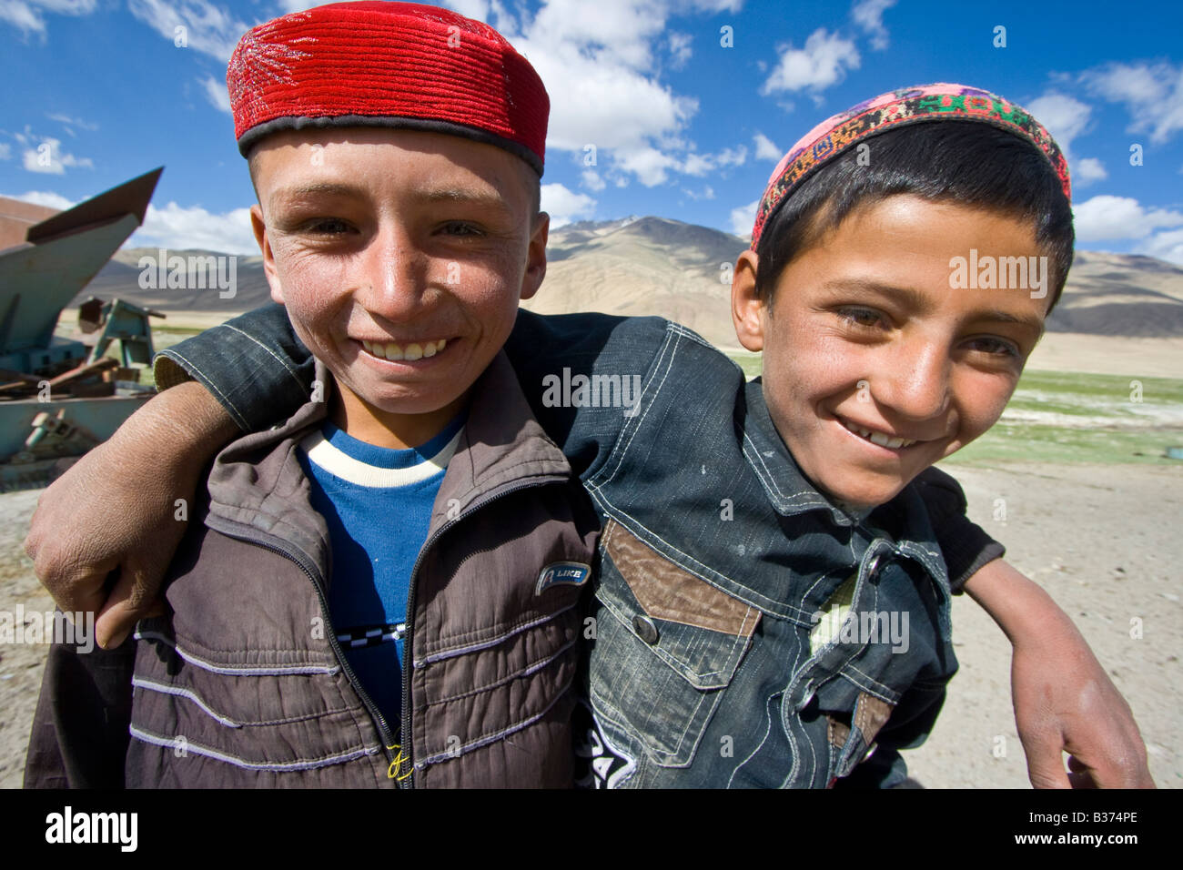 Muslim Boys in Bulunkul in the Pamirs in Tajikistan Stock Photo