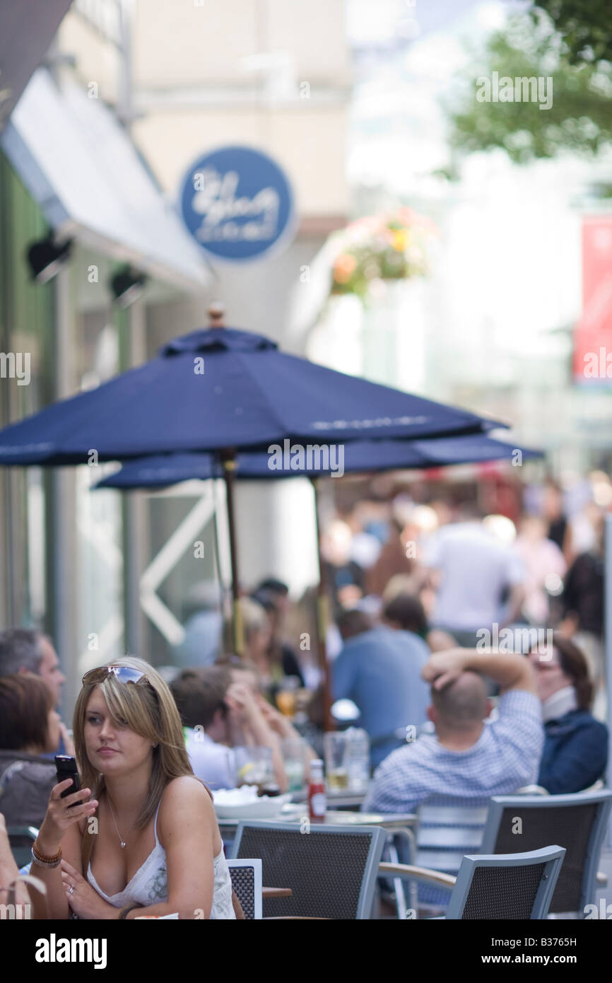 Eating and drinking outside cafe bar restaurant Cardiff Stock Photo - Alamy