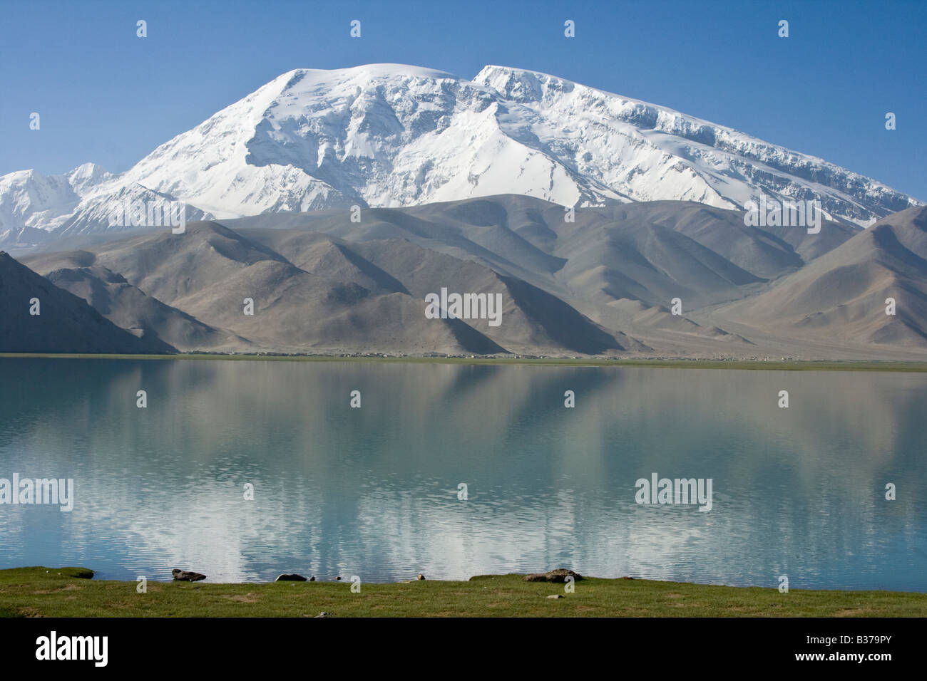 Mountain Scenery at Kara Kul Lake on the Karakoram Highway in Xinjiang Province China Stock Photo