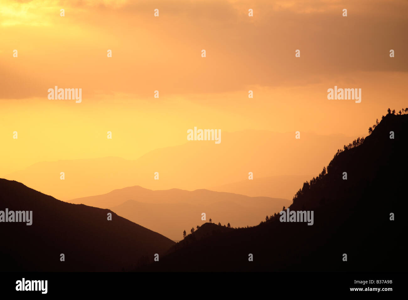 Sunset over mountain Stock Photo