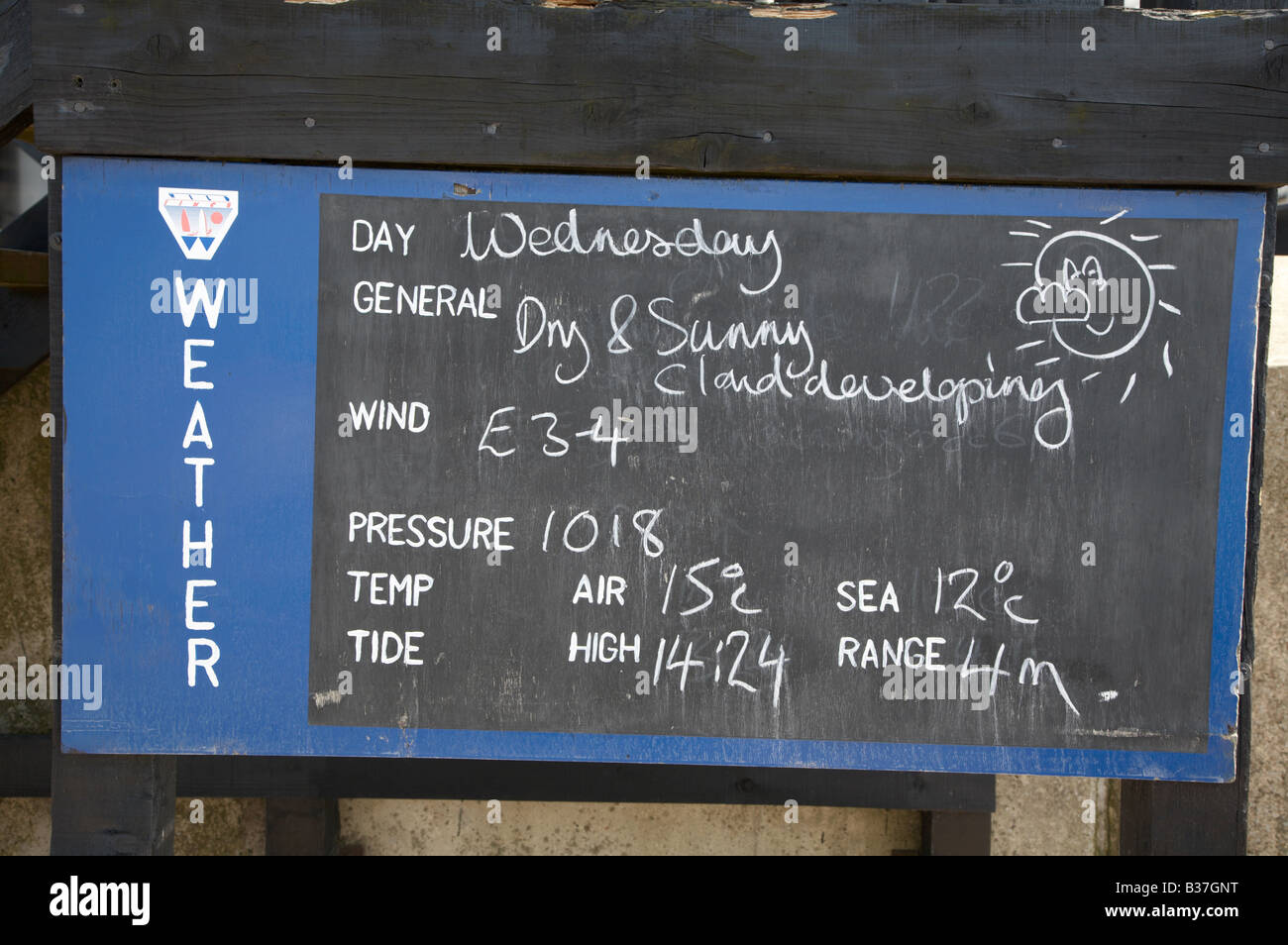 Weather notice board reporting the days weather forecast Stock Photo