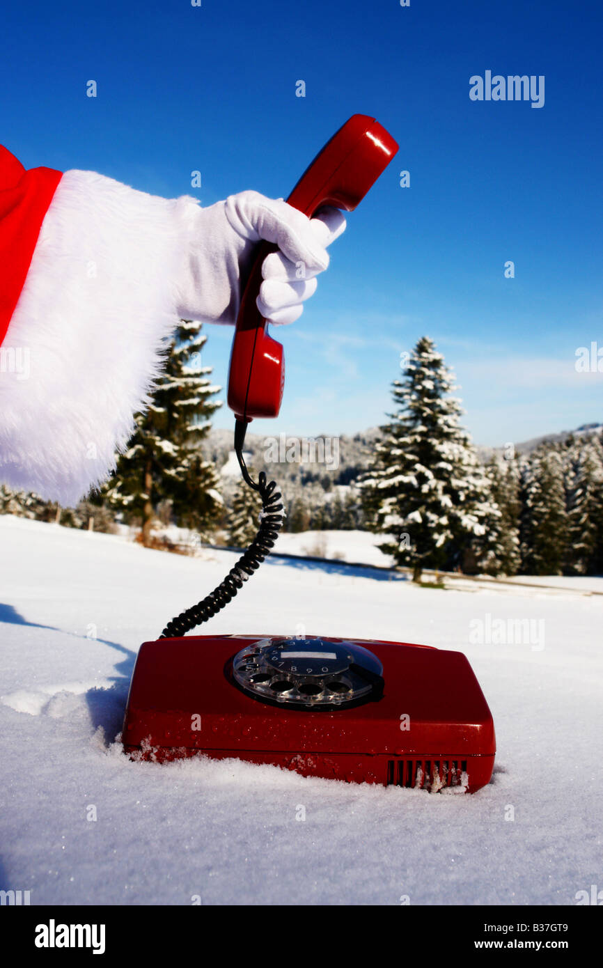 Santa Claus Hotline symbolized by a red retro phone Stock Photo Alamy
